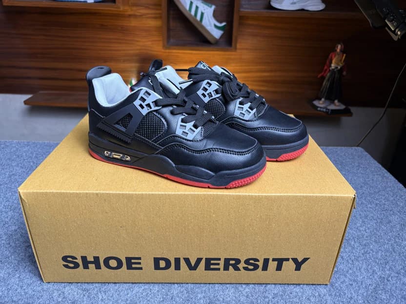 N𝐢ke Air Jordan 4 Kids Bred Reimagined